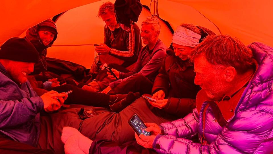 Expedition team using Satellite Communication by AST during the Antarctic Quest 21 Expedition