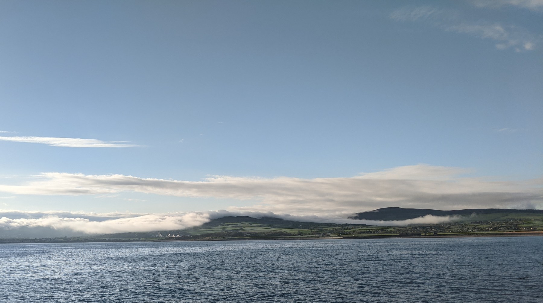 Clouds over land and sea