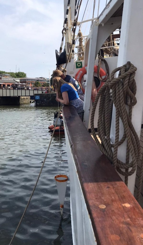 Olivia and I aboard Pelican of London collecting plankton in Bristol Harbour.