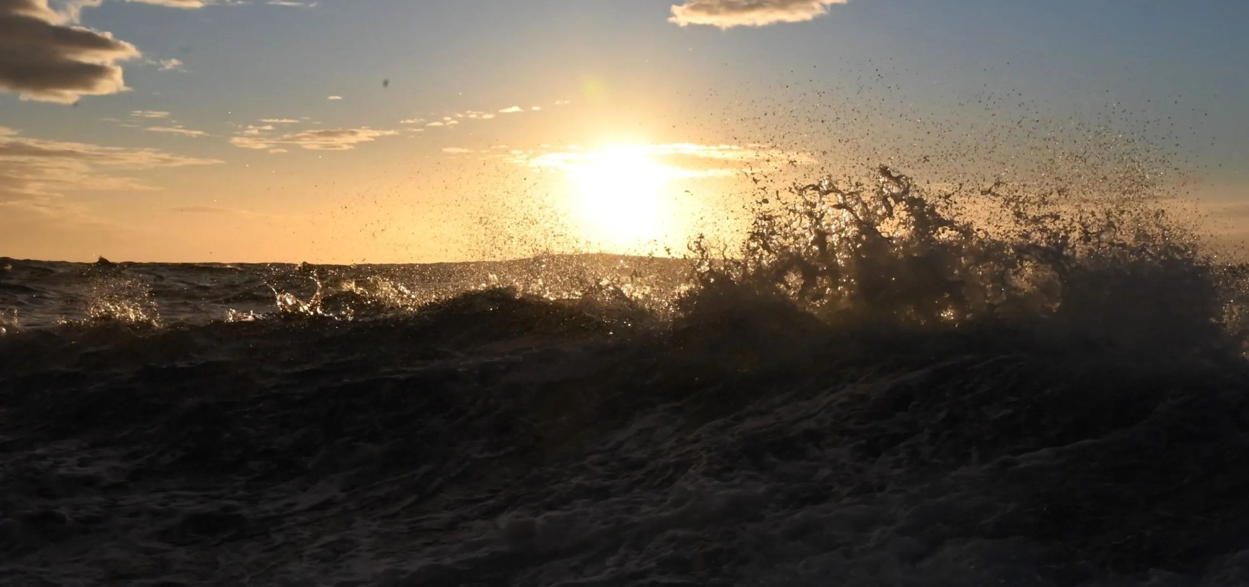 The atmosphere - ocean interface, where gas exchange takes place to establish and maintain equilibrium. (c) C Braungardt 2022